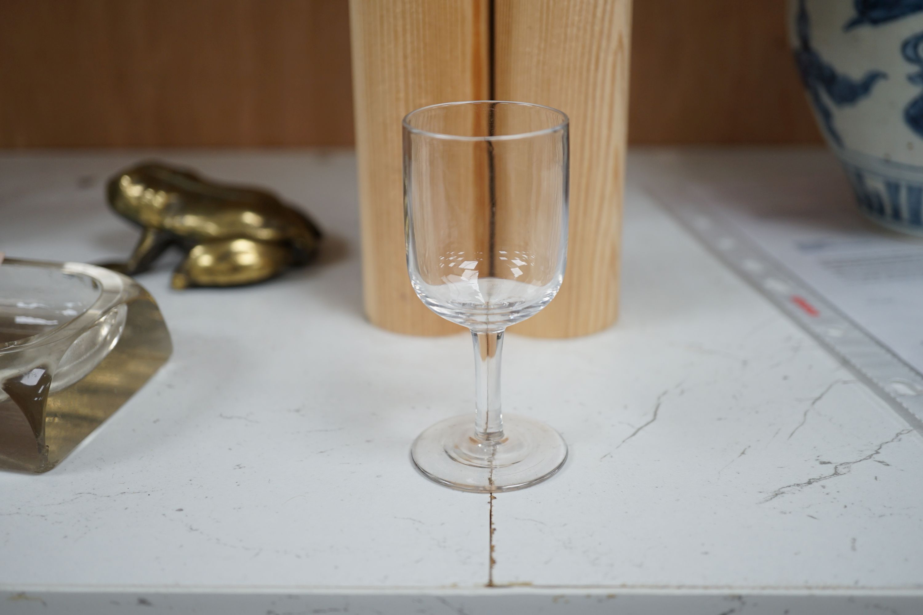 A Victorian coromandel wood two door decanter box, with two decanters and six glasses, 24cm high x 33cm wide